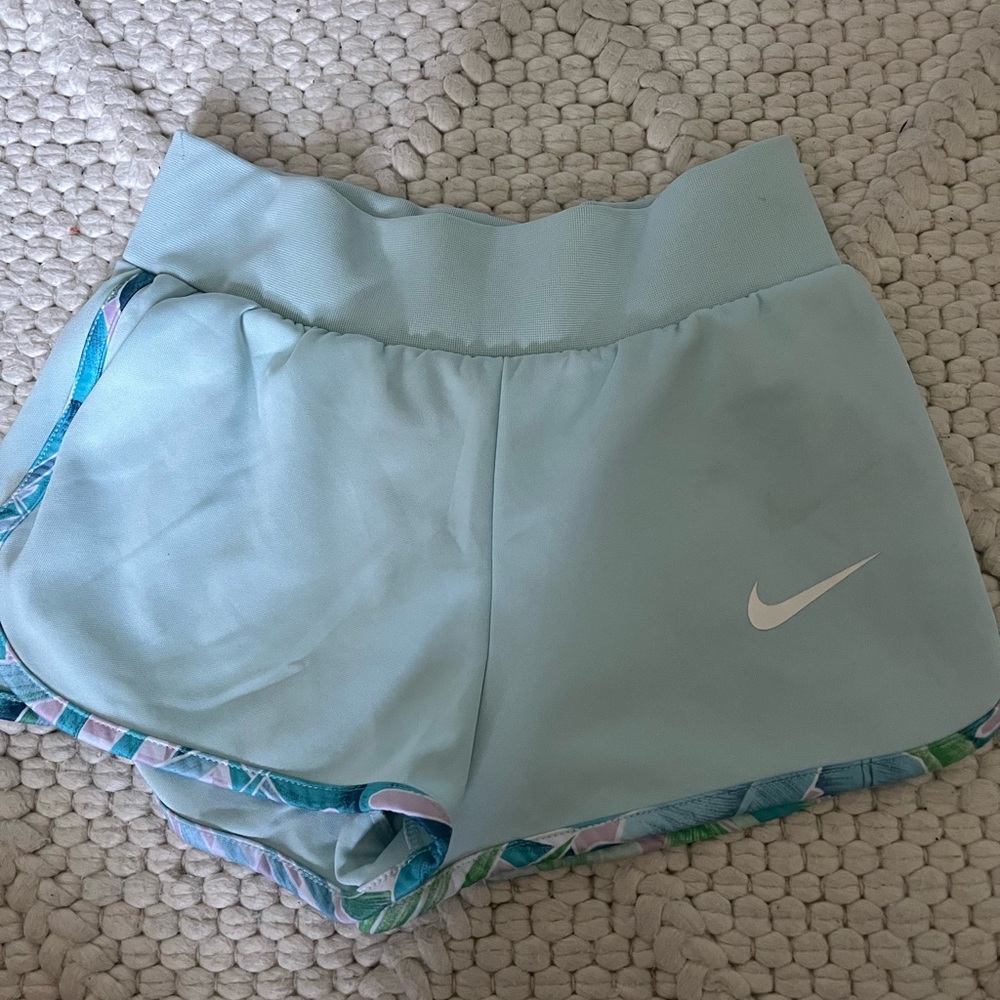 Blue Nike shorts